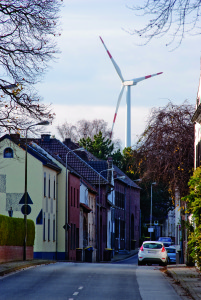 Wind turbine and small town in Germany